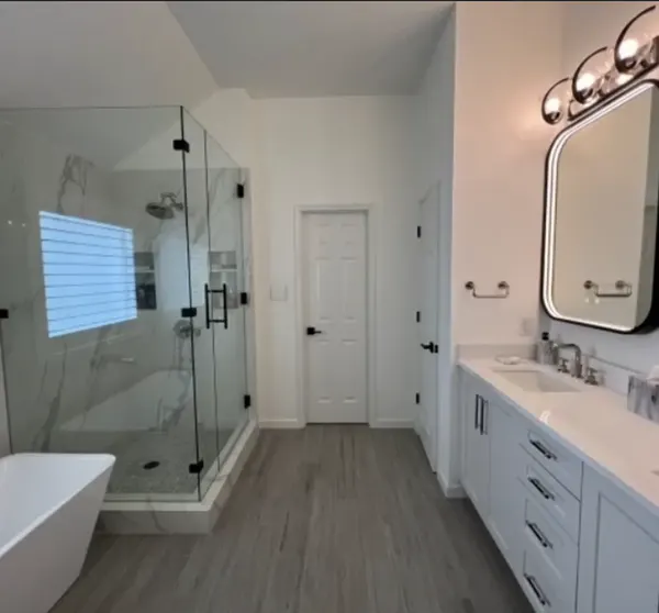 Bathroom remodel with frameless glass shower, by a remodeler serving Georgetown, TX